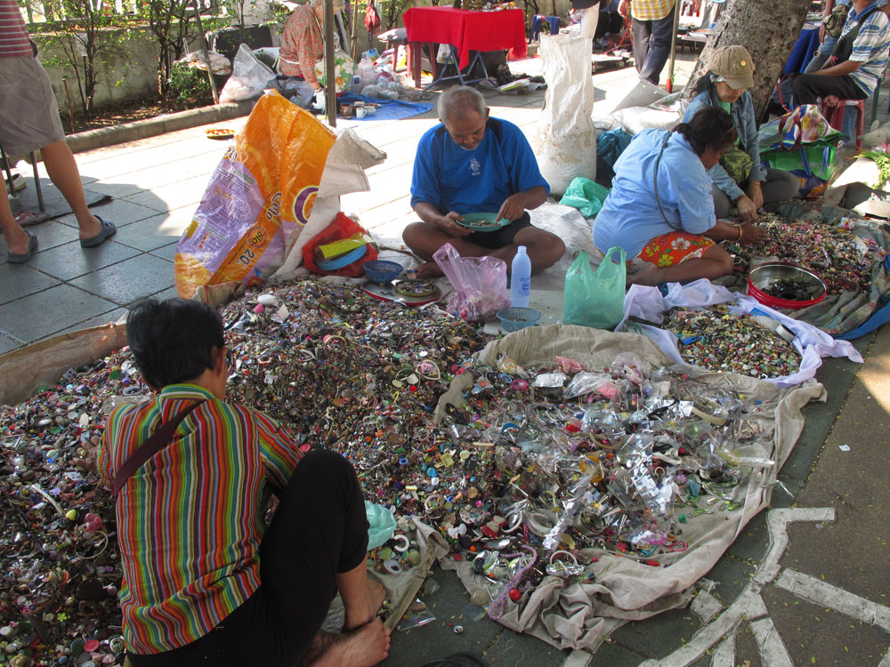 a pile of stuff at a street market in bangkok thailand