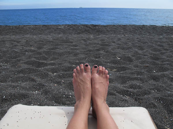 black sand beach on the island of santorini in Greece