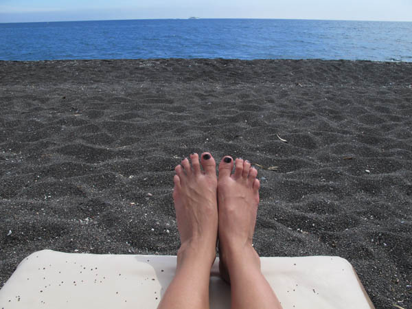 Black Sand of Santorini black sand beach on the island of santorini in Greece
