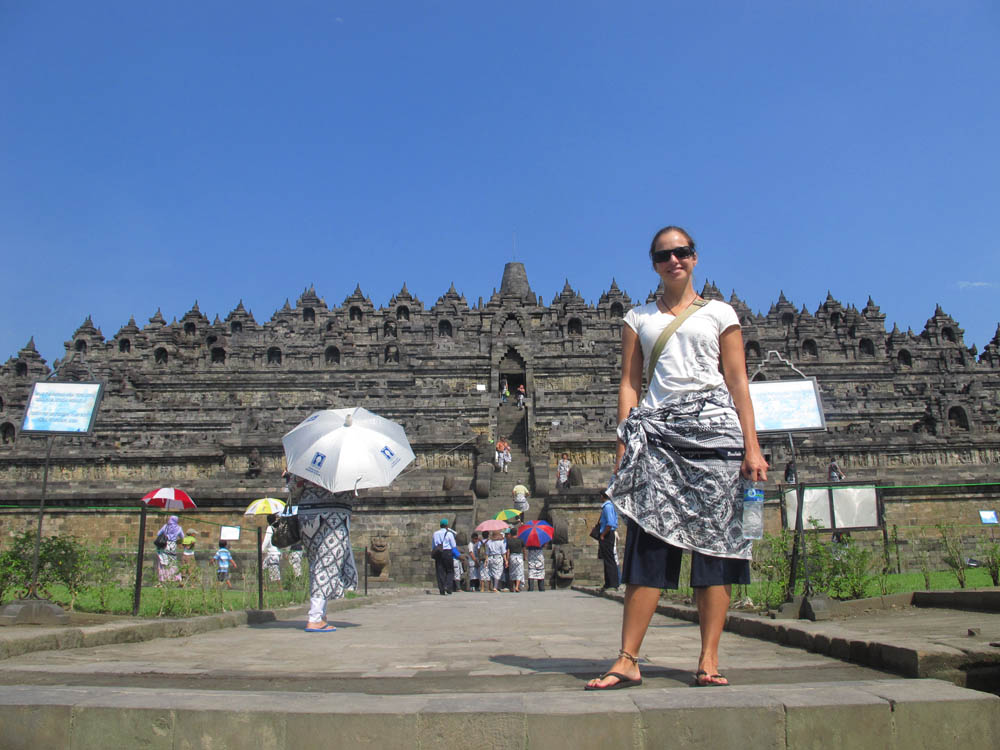 posing in front of Borobudur Temple in Java