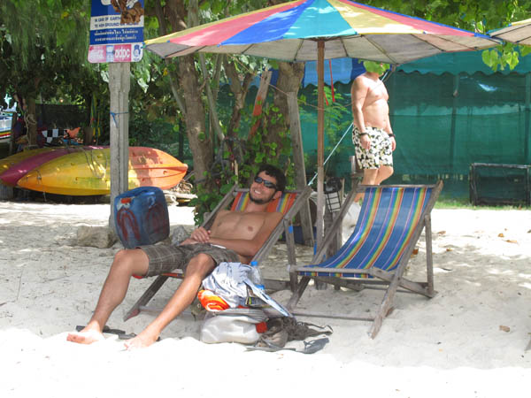 lounge chairs on the beach in Loh Dolum bay on Koh Phi Phi, Thailand