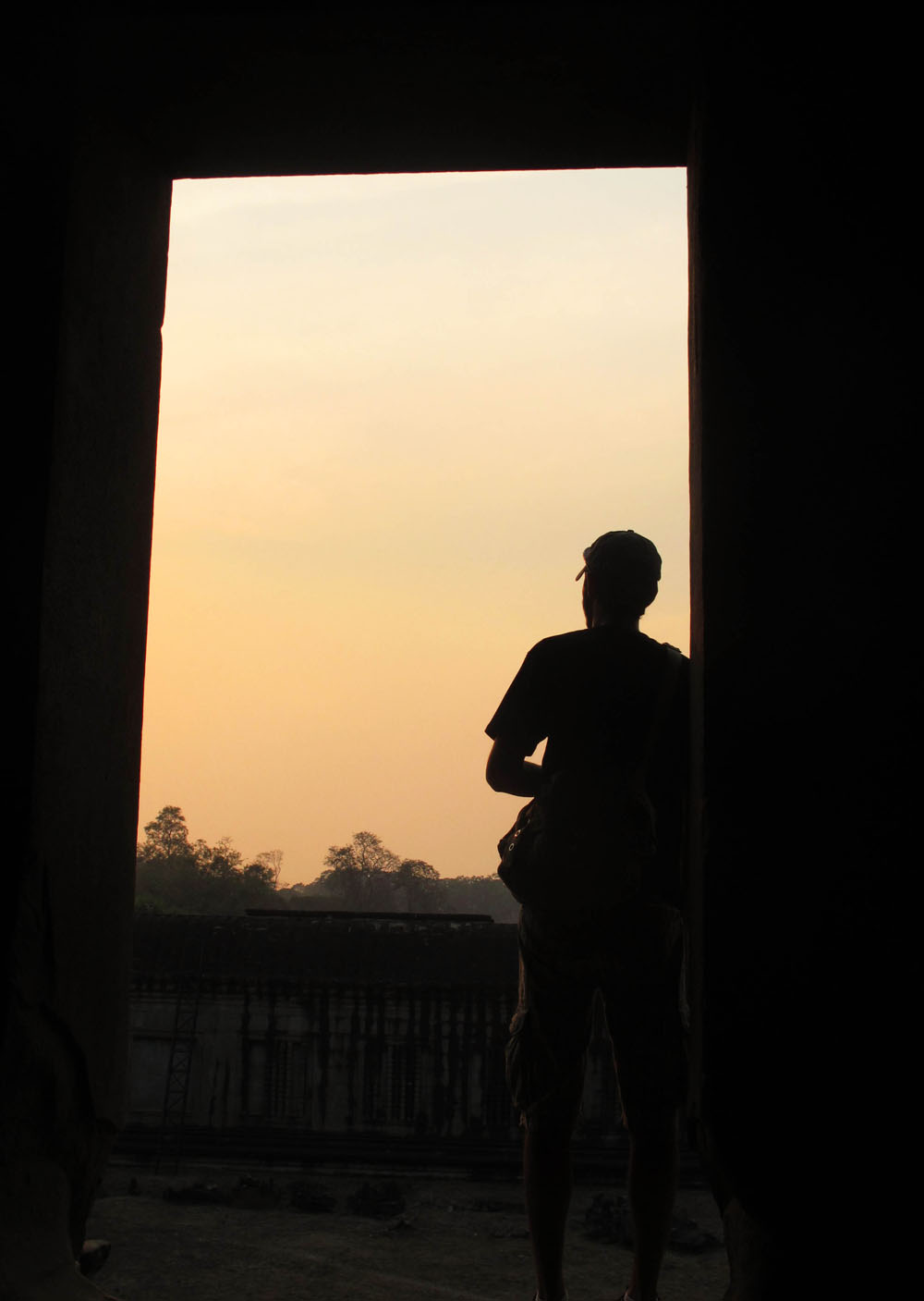Matt watches the sunset at angkor wat