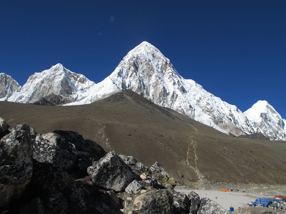 moonlike hills in front of himalayan peaks