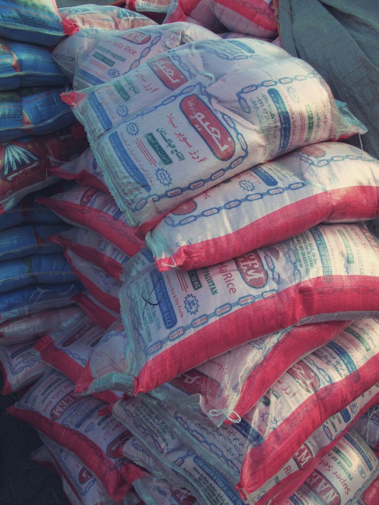 Rice on the Dock Rice on the Dock, being loaded onto boats in The Creek, headed for Iran