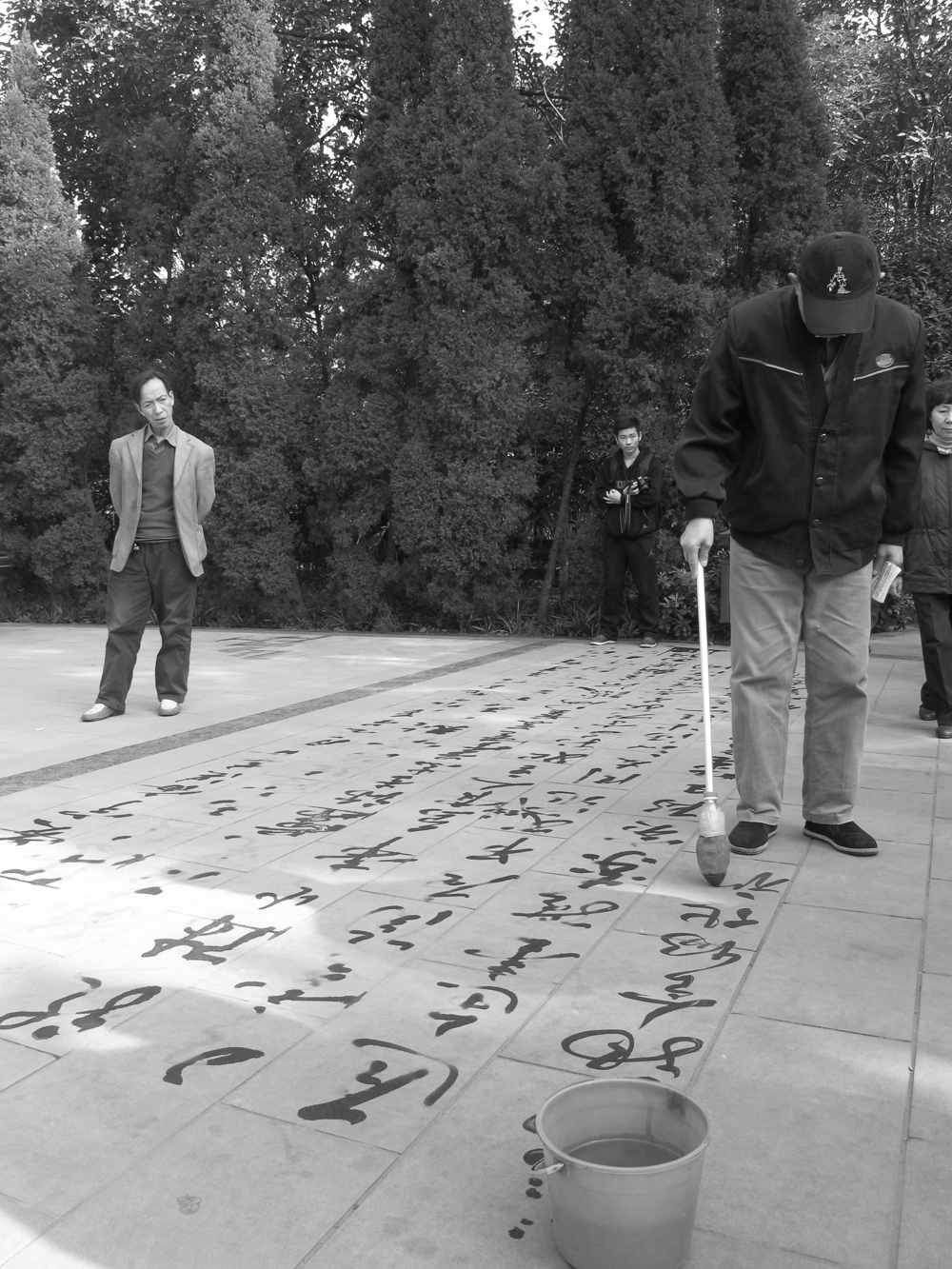 Writing characters in People's Park, Chengdu, China