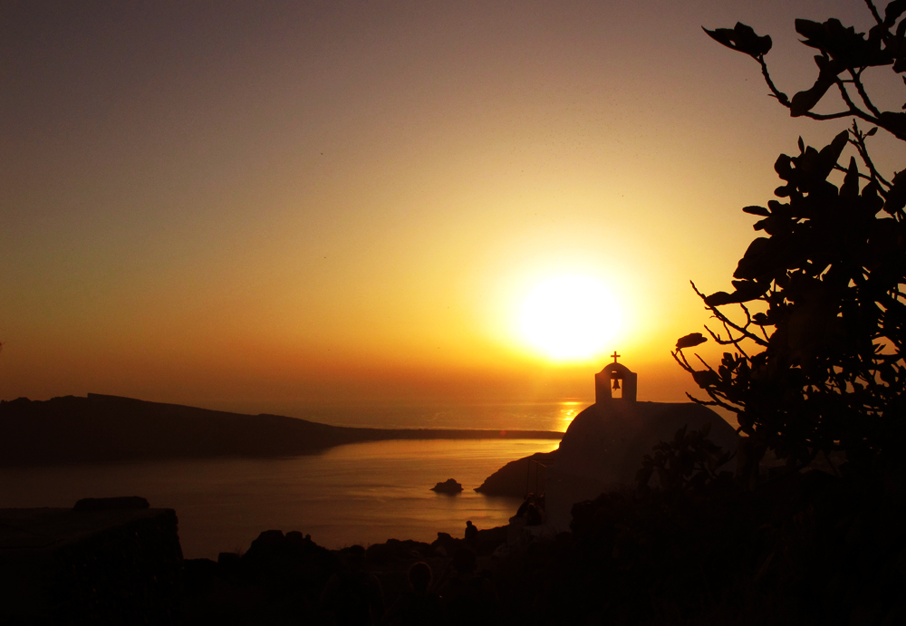 Santorini Sunset over church greece travelshus