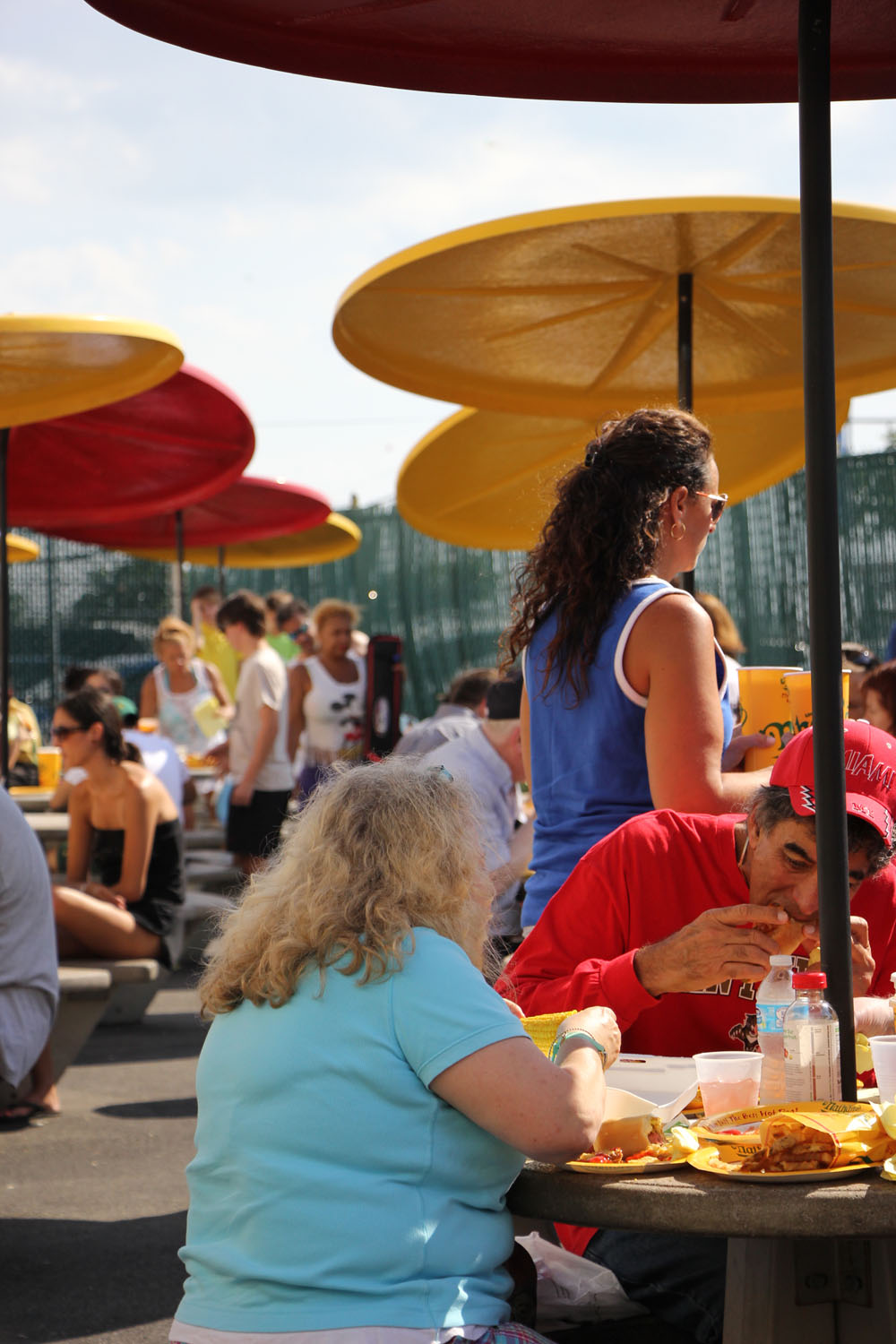 Enjoying Nathan's hot dogs Coney Island