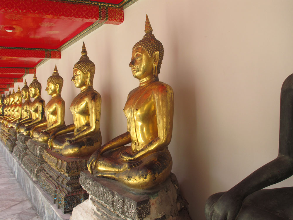 Hundreds of buddhas at Wat Pho, Bangkok, Thailand