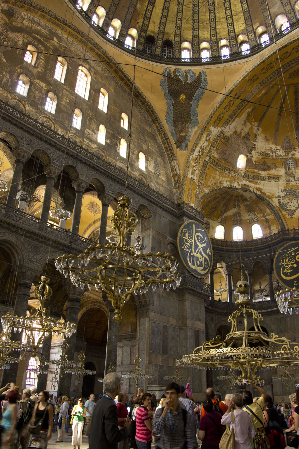 Wandering below the chandeliers in Aya Sofya, Istanbul