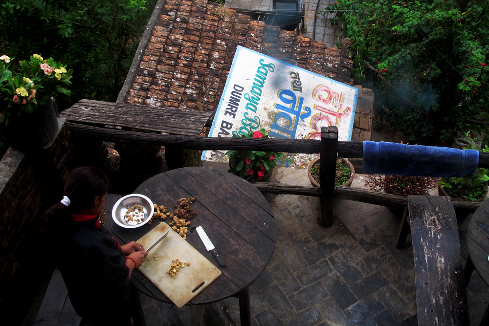 Chopping ginger at hte Bandipur Guest House | Nepal