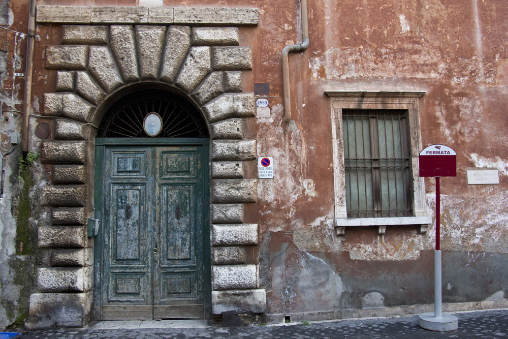Faded green door in Trastevere | Rome, Italy