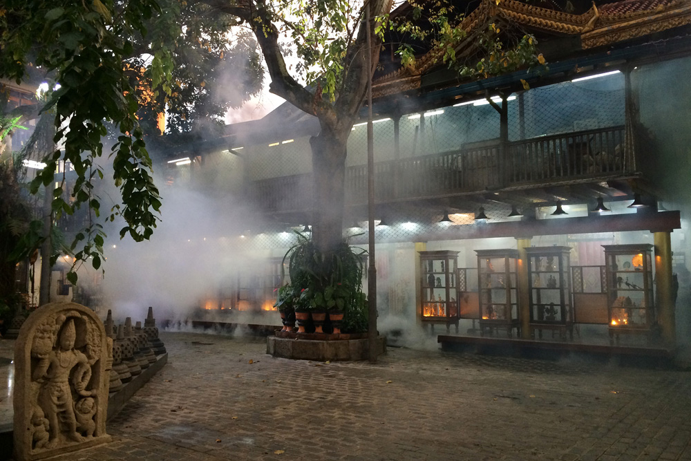 Mosquito fog | Gangaramaya Temple, Sri Lanka
