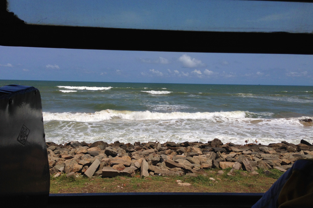 View of the Indian Ocean from inside a train car | Sri Lanka