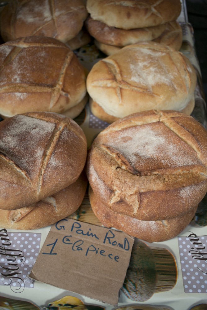 Bread rounds | Marche Bastille, Paris, France