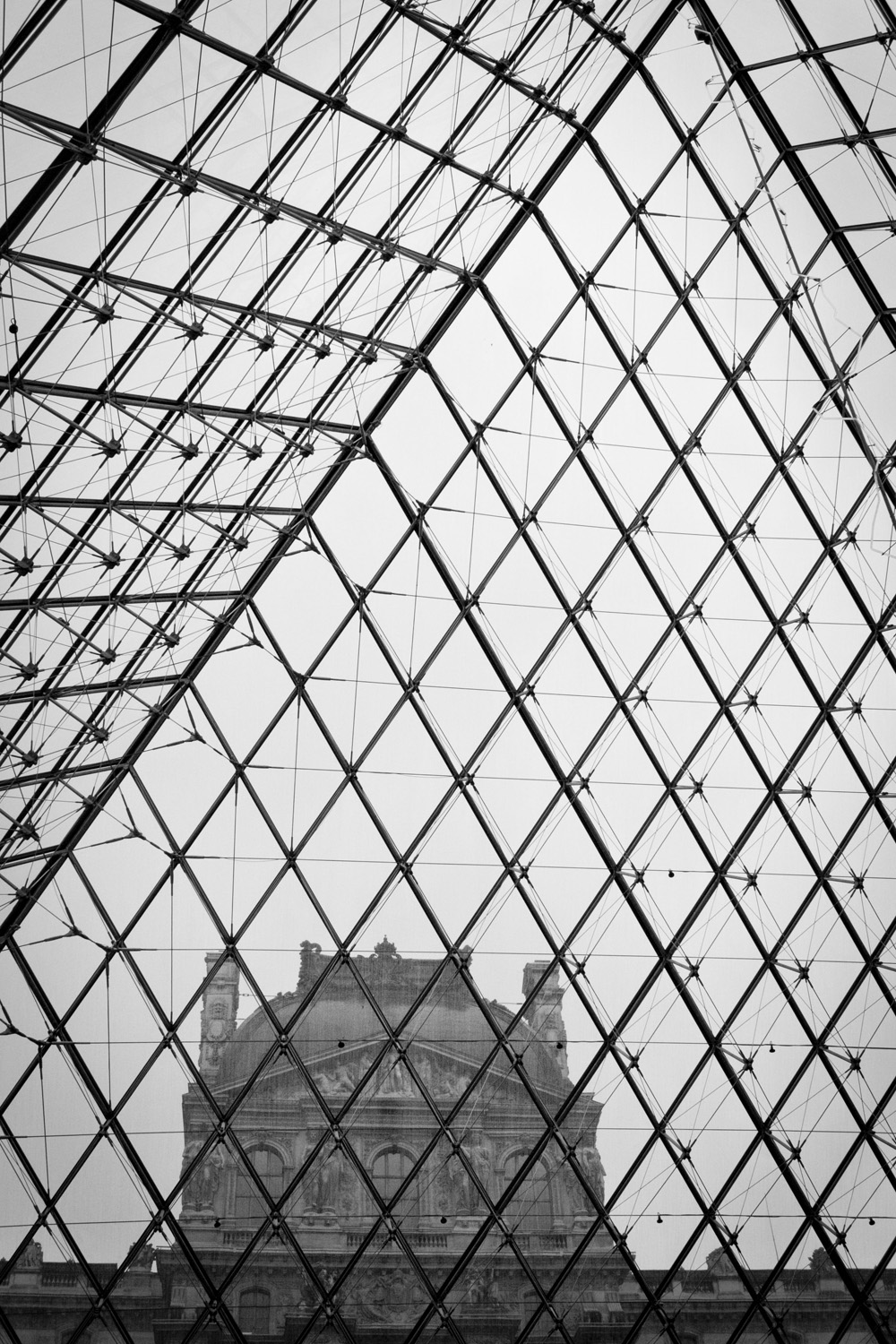 Looking up through the pyramid | Louvre, Paris, France