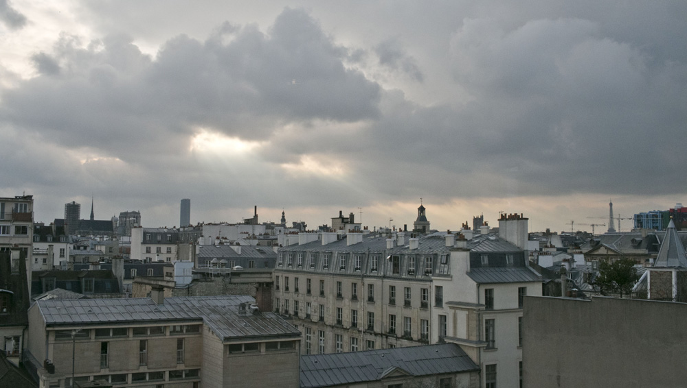 Sun rays over rooftops from the Picasso Museum-in le marais | Paris, France