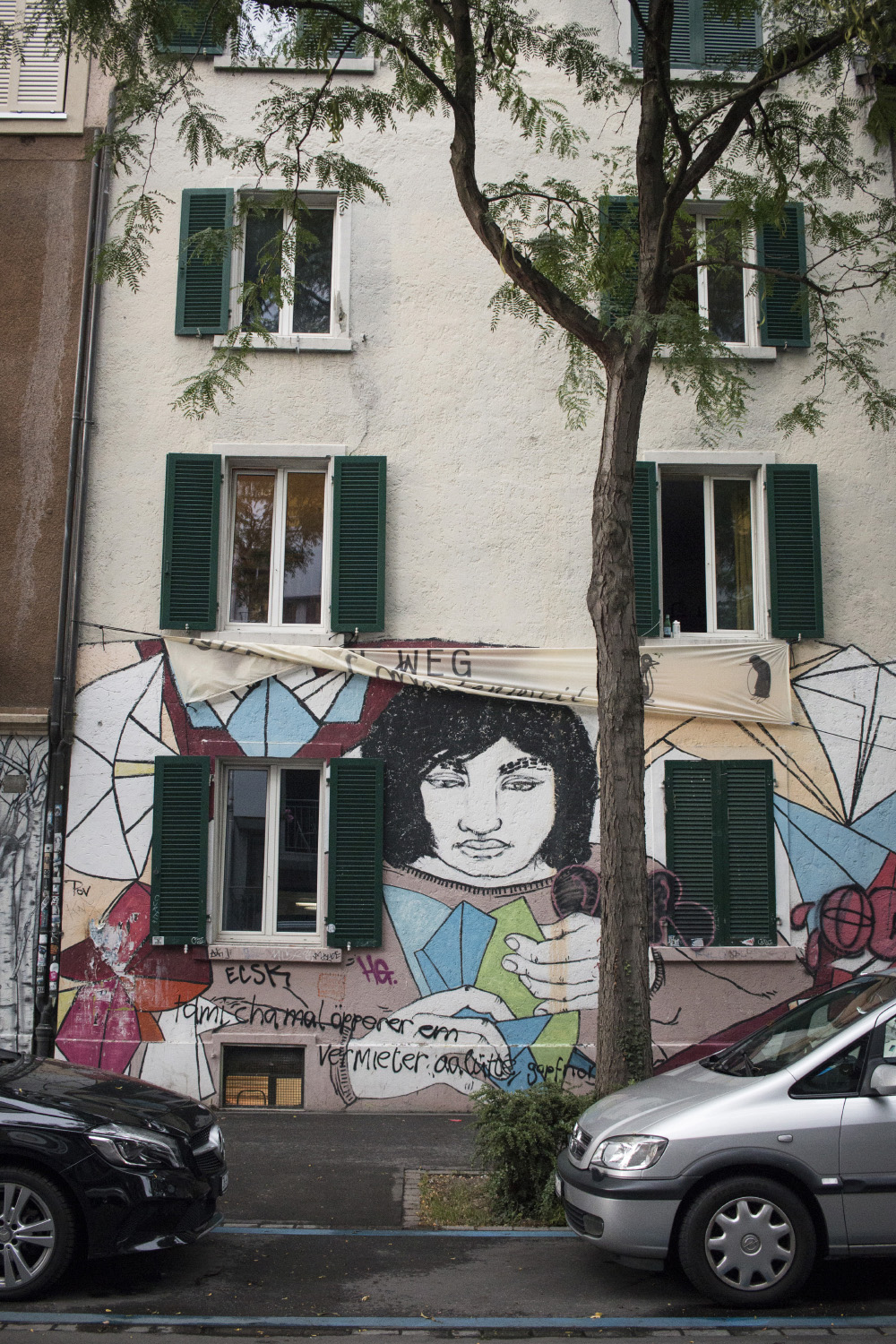 Apartment building graffiti in Gewerbeschule | Zurich, Switzerland