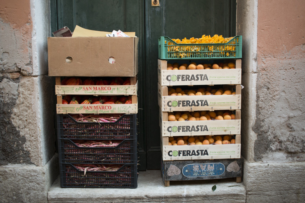 Doorway crates at the market | Venice, Italy