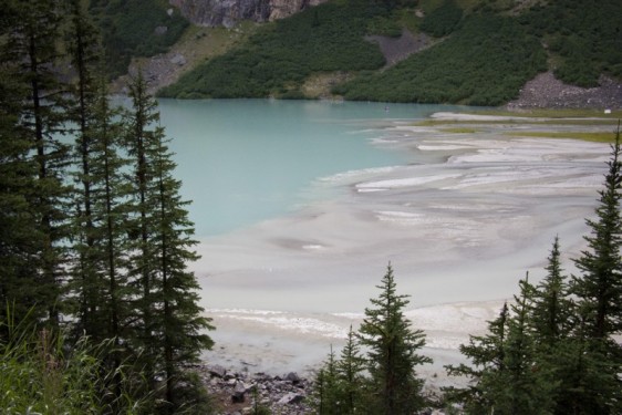 Glacial blue water on the far side of Lake Louise | Banff, Canada