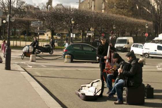 Trio playing music outside Notre Dame | Paris, France