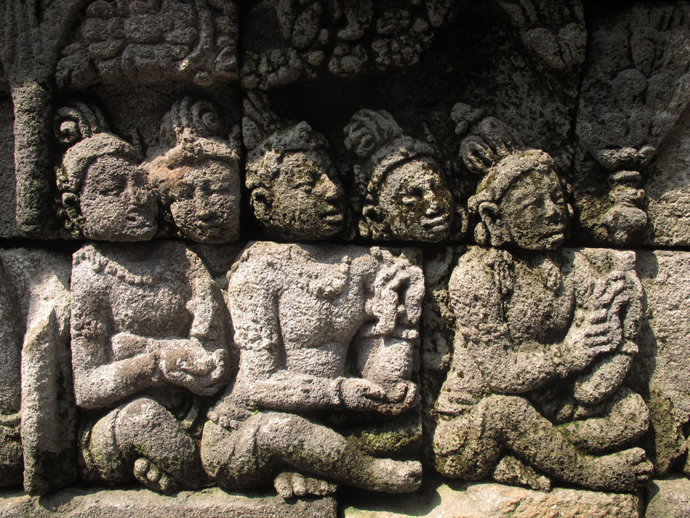 stone carvings on the walls of Borobudur Temple on Java