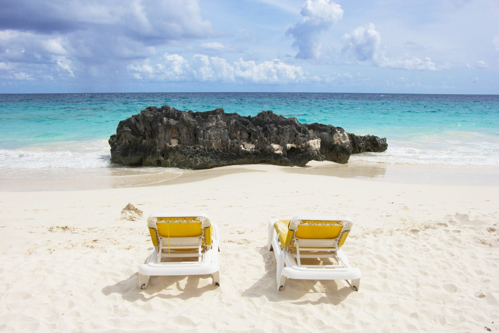 Lounge chairs on Elbow Beach | Coco Reef, Bermuda